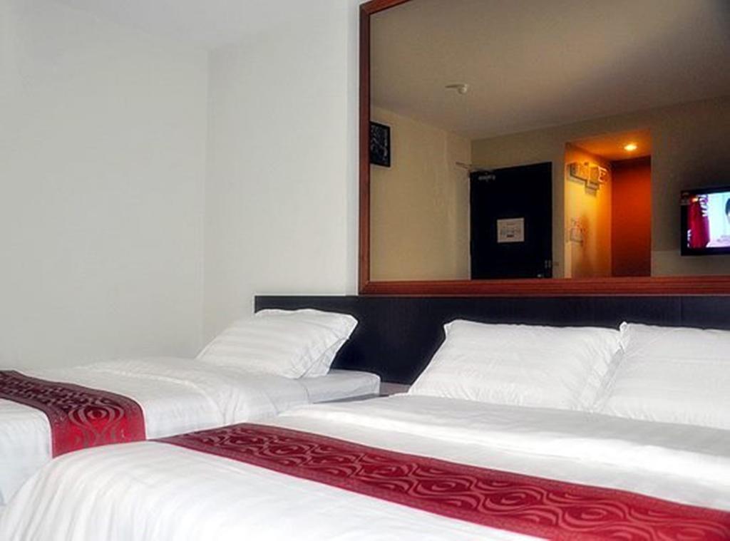 Goldenhill Hotel Кота-Кинабалу Номер фото